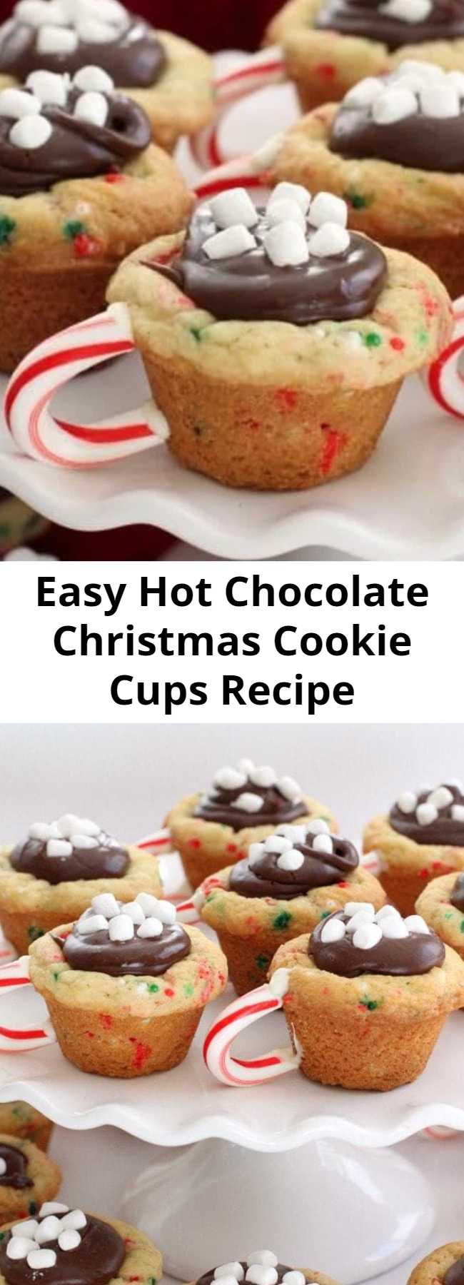 Easy Hot Chocolate Christmas Cookie Cups Recipe - Hot Chocolate Cookie Cups are the most fun & festive Christmas cookies ever! Sugar cookie cups filled with fudge, mini marshmallows & sprinkles with a darling candy cane handle!