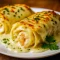 Overhead shot of creamy Seafood Lasagna Roll Ups filled with shrimp, crab, and Alfredo sauce, topped with bubbling mozzarella and Parmesan — a comforting Seafood Dish Recipess perfect for Seafood Dinner Ideas, Seafood Meals, or anyone who loves Gourmet Seafood Recipes like Crab Pasta Recipes and a delicious Shrimp Roll Recipe.