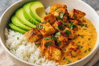 A vibrant Coconut Chicken Bowl with creamy coconut sauce, tender chicken, fluffy rice, and colorful veggies, styled as a tropical Coconut Rice Dinner for quick Cozy Meal Prep and flavorful Yummy Rice Bowls.