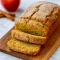 Close-up Of Apple Cinnamon Bread loaf coated in cinnamon sugar, inspired by Apple Cider Donuts — a cozy Apple Cider Donut Bread Recipe that tastes like Farmhouse Apple Fritter Bread With Cider Glaze. Perfect Dessert Bread for fall, great for fans of Bread Recipes Sweet and Bread Recipes Homemade who want to learn How To Make Apple Cider Bread or How To Make Apple Cider Donut Bread at home.