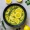 Golden bowl of Lemon Ginger Soup filled with shredded chicken, fluffy rice, and fresh herbs. This healthy soup is one of the best Tumeric Recipes Inflammation friendly meals — a soothing Immune Boosting Dinner packed with flavor. A comforting Ginger Chicken Rice Soup that highlights simple Turmeric Recipes Dinners, perfect for cozy nights, wellness cooking, and hearty Soup Recipes With Rice.
