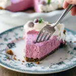 Slice of Cranberry Mousse Dessert on a plate, styled like a Cranberry Pomegranate Mousse Pie and scaled like a Cranberry Slab Pie Recipe, set on a Cranberry Tart With Gingersnap Crust with nods to Cranberry Custard Pie Food Network classics — a fresh take on Traditional Holiday Desserts that even Indian Pudding fans will love; perfect Cranberry Dessert or elegant Cranberry Pie.