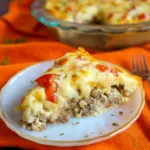 Cheesy baked Gluten Free Cheeseburger Pie in a pie dish with golden melted topping, perfect for low-carb comfort food lovers searching for Carb Free Hamburger Recipes, easy Gluten Free Hamburger Recipes For Dinner, and hearty Gluten Free Recipes With Hamburger Meat or Hamburger Recipes Gluten Free options; includes tender beef filling for delicious Gluten Free Recipes Hamburger Meat meals with all the flavors of a Gluten Free Cheeseburger, ideal as a satisfying Healthy Cheeseburger Pie and family-friendly Thm Hamburger Recipes dinner.