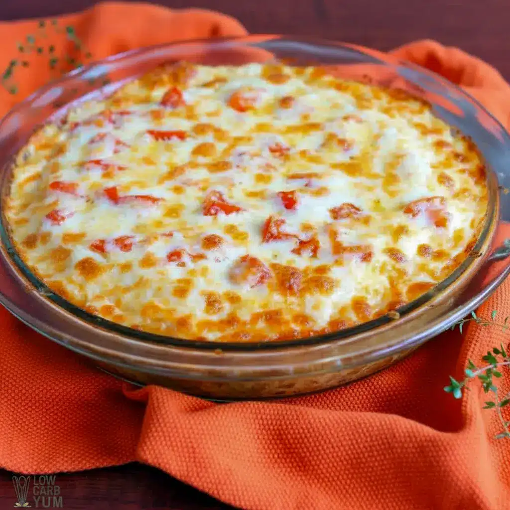 Cheesy baked Gluten Free Cheeseburger Pie in a pie dish with golden melted topping, perfect for low-carb comfort food lovers searching for Carb Free Hamburger Recipes, easy Gluten Free Hamburger Recipes For Dinner, and hearty Gluten Free Recipes With Hamburger Meat or Hamburger Recipes Gluten Free options; includes tender beef filling for delicious Gluten Free Recipes Hamburger Meat meals with all the flavors of a Gluten Free Cheeseburger, ideal as a satisfying Healthy Cheeseburger Pie and family-friendly Thm Hamburger Recipes dinner.