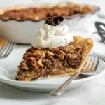Close-up slice of an Exquisite Pie — a nut-studded Dixie Pie Recipe style tart; perfect visual for a classic Kentucky Pie Recipe, evoking that homestyle Dixie Pie charm.