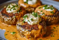 Close-up of a feta-stuffed burger on a lettuce wrap, drizzled with tomato cream — Best Keto Burgers styled to highlight Keto Feta and a tasty Keto Dinner Beef option.