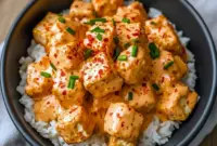 Crispy Bang Bang Tofu cubes glazed in spicy-sweet sauce over rice — a simple Fast Vegan Dinner and one of the Best Tofu Dinners.