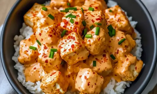 Crispy Bang Bang Tofu cubes glazed in spicy-sweet sauce over rice — a simple Fast Vegan Dinner and one of the Best Tofu Dinners.
