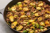 A skillet of Ground Beef and Brussels Sprouts served as a cozy Meal Idea With Ground Beef with tender Brussels sprouts, saucy beef, and a quick homemade dinner vibe.