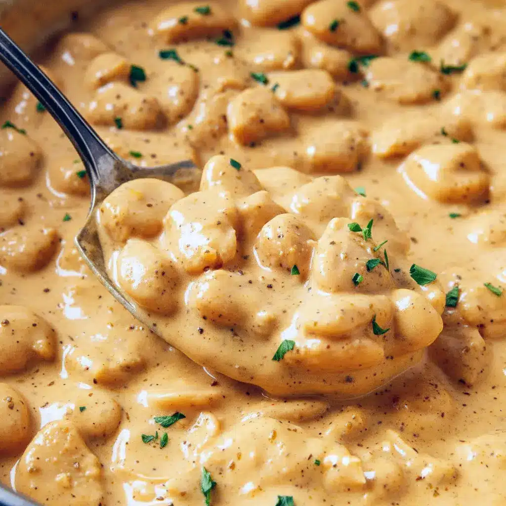 A warm skillet of Garlic Parmesan Butter Beans with a rich sauce, inspired by the flavor of Best Butter Beans.