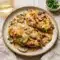 Chicken Riesling with Chicken Riesling Cheesecake Factory flavors, creamy sauce, and crispy bacon in a rich dinner skillet.