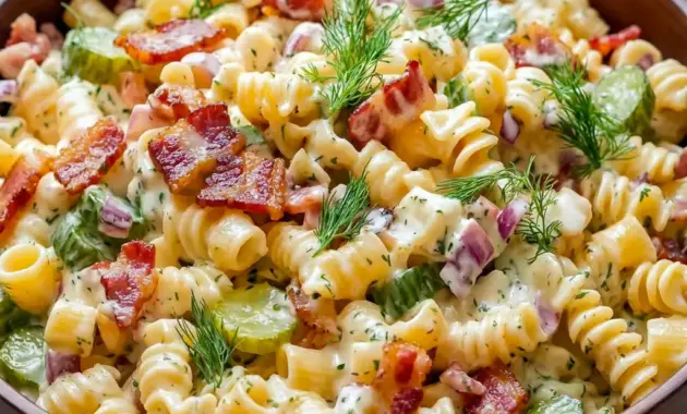 Dill Pickle Bacon Pasta Salad in a creamy bowl with crunchy bacon and Fun Salad Recipe appeal for parties.