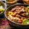 Crockpot Chipotle Pineapple Pot Roast Bowl with tender shredded beef, a sweet and smoky Pineapple Pot Roast flavor, and a rice base.