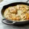 Sour Cream and Onion Chicken served in a creamy skillet, making an easy Low Carb Dinner for busy nights.