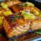 Honey Pineapple Glazed Salmon plated with fresh lime and a bright Hawaiian Salmon finish.