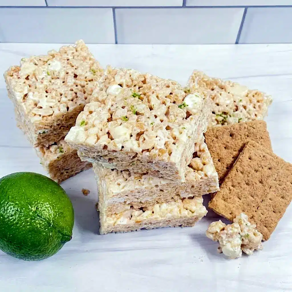 Key Lime Pie Rice Krispie Treats served as a sweet Rice Crispy Key Lime Pie inspired bar with graham cracker bits and white chocolate.