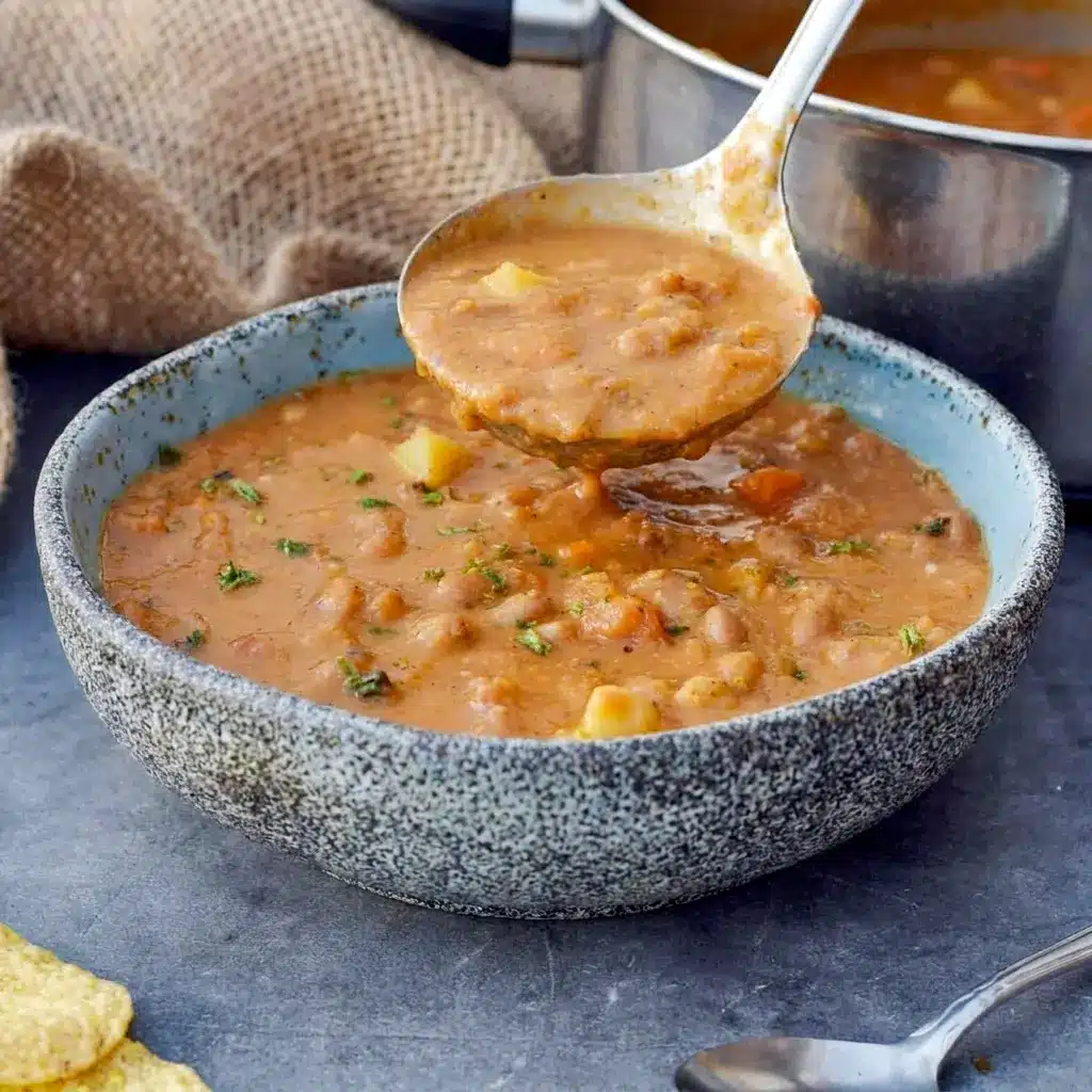 Mexican Pinto Bean Soup simmered with tomatoes and vegetables, a flavorful Mexican Bean Soup Recipes choice for meal prep.