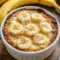 A warm pan of Southern Banana Cobbler served bubbling and golden, styled as a cozy Banana Cobbler Recipe for family dessert night.