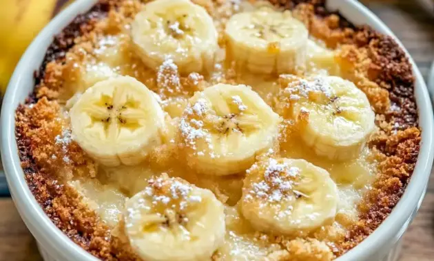 A warm pan of Southern Banana Cobbler served bubbling and golden, styled as a cozy Banana Cobbler Recipe for family dessert night.