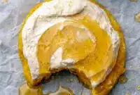 A cozy tray of Cornbread Cookies topped with honey frosting, perfect for To Go Dessert Ideas and fall gatherings.