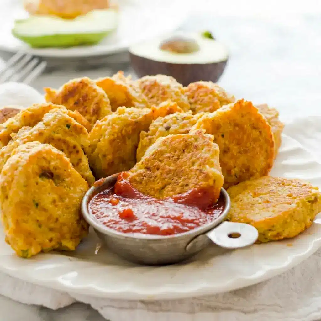 Chickpea Vegetable Nuggets on a toddler lunch plate with dipping sauce, a fun idea for Chickpea Recipes For Toddlers.