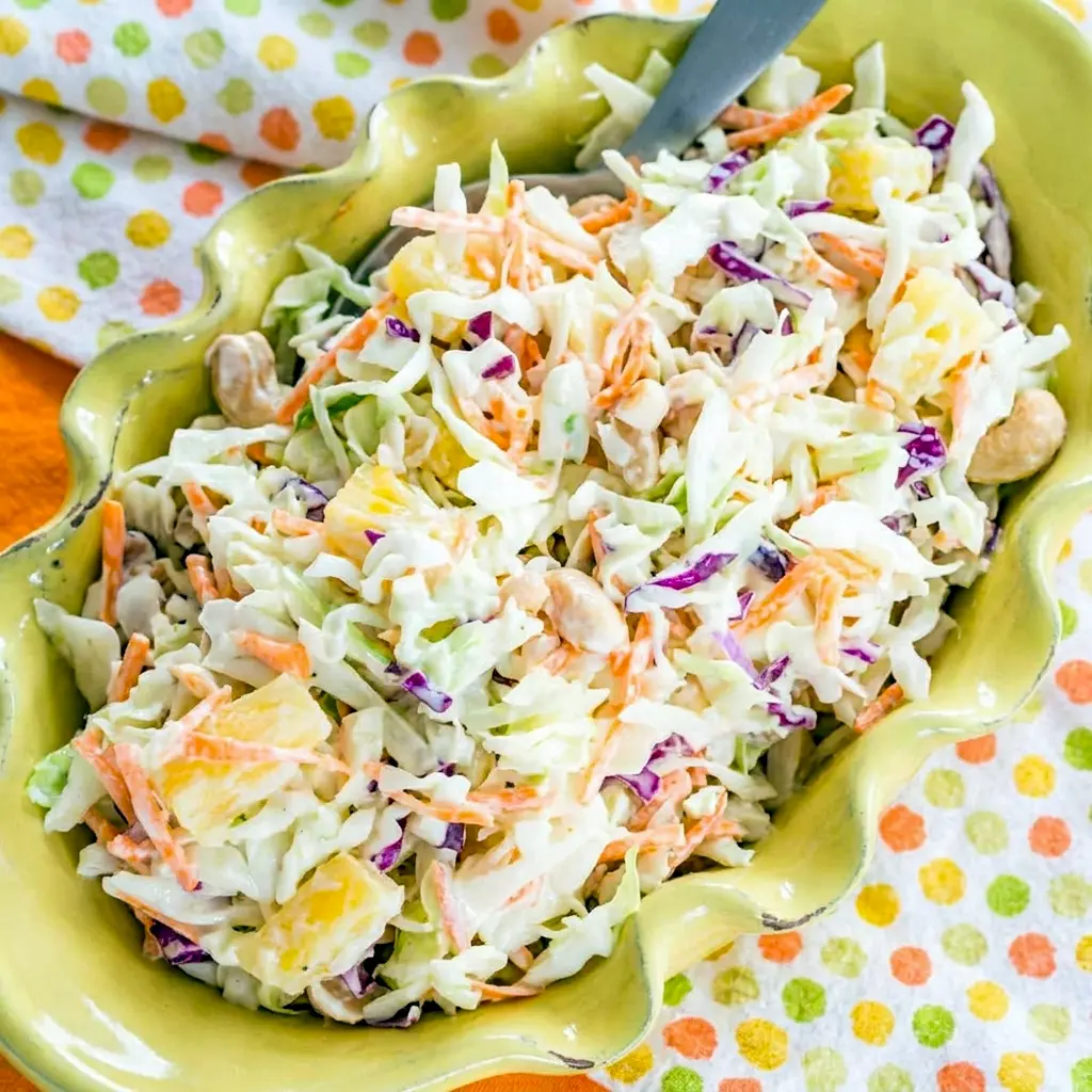 Fresh Hawaiian Pineapple Coleslaw in a bowl, a bright Hawaiian Salads side for summer cookouts.