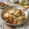 A creamy casserole of French Onion Chicken and Rice with golden cheese and Everyday Food Recipes comfort.