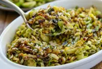 Shredded Brussels Sprouts skillet with parmesan and balsamic glaze, a simple Keto Shredded Brussels Sprouts side dish that feels crisp and rich.