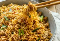 Ground Chicken Sweet Chili Noodles served in a glossy skillet bowl with a bold Sweet Chili Noodles Recipe flavor.