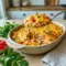 Pimento Cheese Hash Brown Casserole baked golden for a cozy Cheese Hashbrown Casserole side dish.